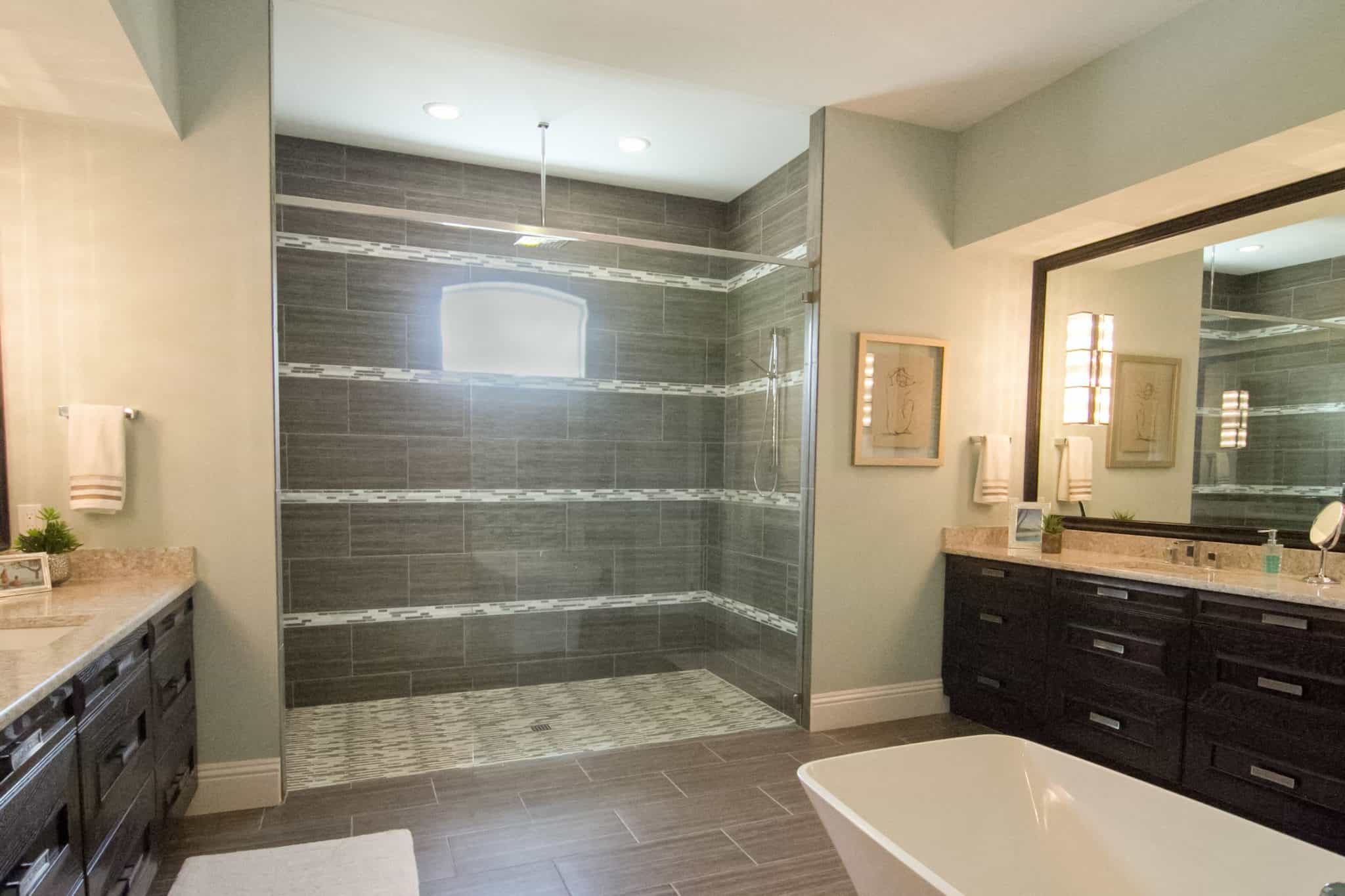 large bathroom with dark wood cabinets