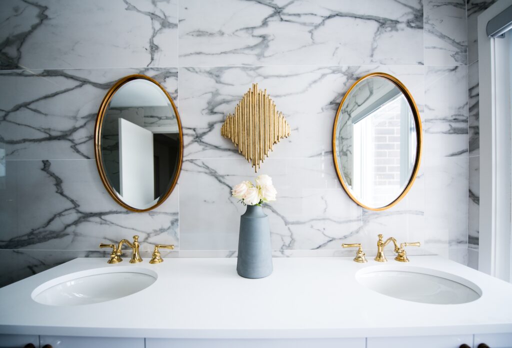 Use mirrors to brighten a dark bathroom